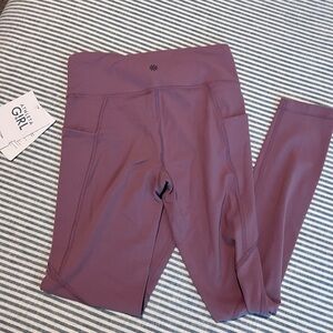 NWT - Athleta girl high rise stash your treasure tight. Mauve color size 12